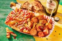 Chopped VW Currywurst With Chips and Sauces