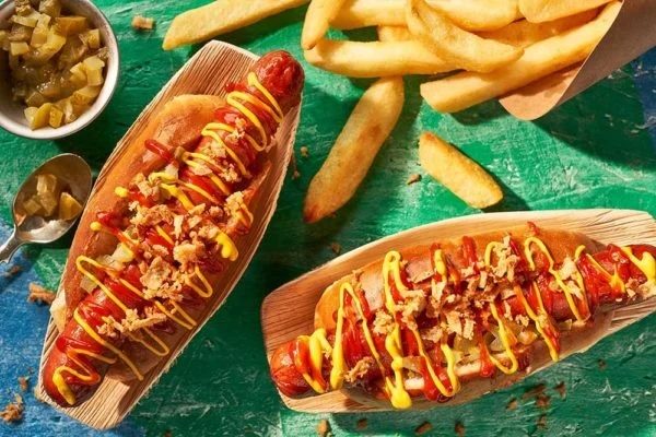 American-style Hot Dogs With Buns, Chips and Sauces