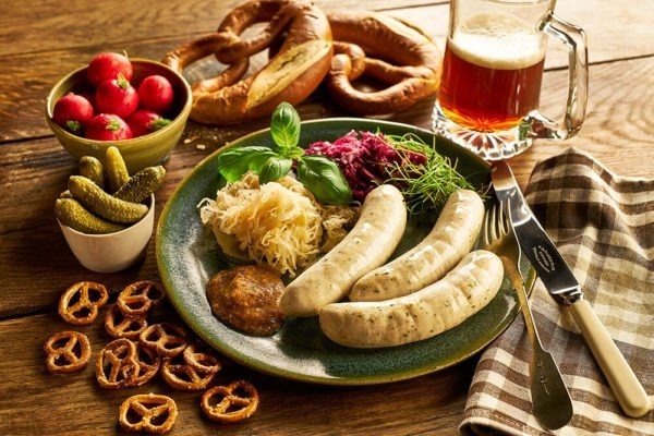 A Plate of German White Sausage With Pretzels, Sauerkraut and a Stein of Beer
