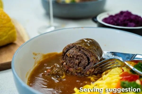 Beef Roulade Served with Gravy and Rice